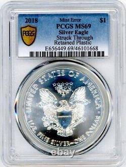 2018 Silver Eagle MS69 PCGS Mint Error Struck Through Retained Plastic