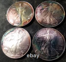 Lot of 4 2004 2007 2008 2010 Silver Eagle MONSTER RAINBOW Toned 1oz GEM BU RARE