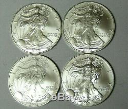 Lot of 4 American Silver Eagles 2004 2005 2006 2007.999 Fine Silver Dollars