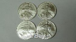 Lot of 4 American Silver Eagles 2004 2005 2006 2007.999 Fine Silver Dollars