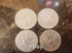 Lot of 4 Silver American Eagle 1 oz. Fine. 999 US oz Coins 1992 2002 2019 2021