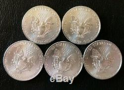 Lot of 5 2014 1 oz Silver American Eagle Coins. 999 fine BU