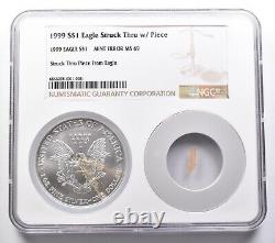 MS69 1999 American Silver Eagle MINT ERROR Struck Thru With Piece NGC 8036