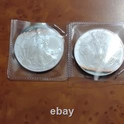 U. S. Mint 2006 and 2008 American Silver Eagle 1 oz. 999 Silver Coins lot of 2