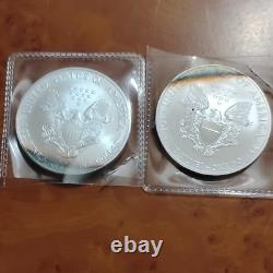 U. S. Mint 2006 and 2008 American Silver Eagle 1 oz. 999 Silver Coins lot of 2