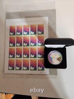 Ultra Rare Woodstock 50th Anniversary Silver Eagle & Matching Stamps MINT