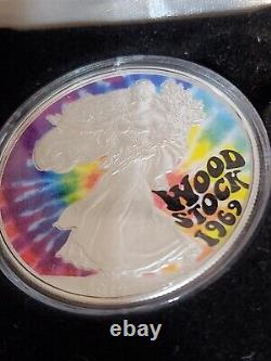 Ultra Rare Woodstock 50th Anniversary Silver Eagle & Matching Stamps MINT