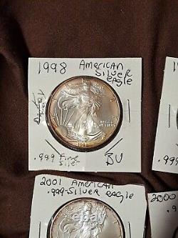 1998, 1999, 2000, 2001 Aigle d'argent américain 1oz Dollars (4) Lot Rare Bu? Toning