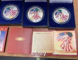 2000 Lot de 4 1oz American Silver Eagle colorisées dans une boîte avec certificat d'authenticité