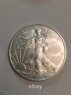 2009 Pièces de 1 dollar American Silver Eagle - 1 Rouleau de 20 dans un Tube de la Monnaie.