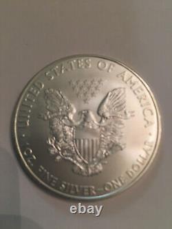 2009 Pièces de 1 dollar American Silver Eagle - 1 Rouleau de 20 dans un Tube de la Monnaie.
