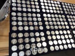 Coffre au trésor de 1986 à 2020 contenant 288 pièces de monnaie américaines en argent Gem BU US American Silver Eagles dans des capsules Air Tites.