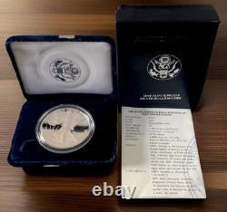 Dollar en argent American Eagle non circulé de 1996 dans sa boîte de la Monnaie avec certificat d'authenticité et emballage d'origine.
