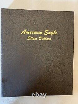 Ensemble de 15 pièces d'aigle d'argent américain 1986-2000 Jamais sorties du livre. État de menthe.