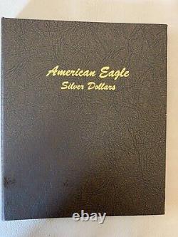 Ensemble de 15 pièces d'aigle d'argent américain 1986-2000 Jamais sorties du livre. État de menthe.
