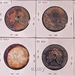 Ensemble de 9 pièces d'argent American Eagle de 1986, qualité Brillant Universel, non circulées, provenant de la Monnaie des États-Unis