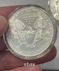 Lot de 5 American Silver Eagles 2000, 2001, 2013, 2014, 2018 dans des capsules BU