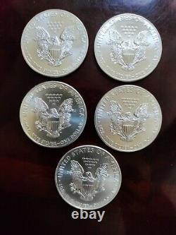 Lot de (5) pièces d'aigles américains BU 2012 en argent fin de 1 once (0,999).