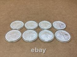 Lot de 8 pièces d’argent American Silver Eagle de 1 oz, États-Unis, 2005