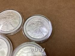 Lot de 8 pièces d’argent American Silver Eagle de 1 oz, États-Unis, 2005