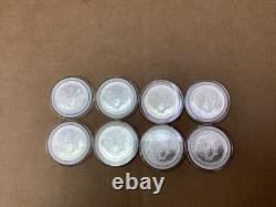 Lot de 8 pièces d’argent American Silver Eagle de 1 oz, États-Unis, 2005