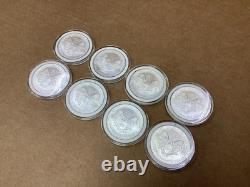 Lot de 8 pièces d’argent American Silver Eagle de 1 oz, États-Unis, 2005
